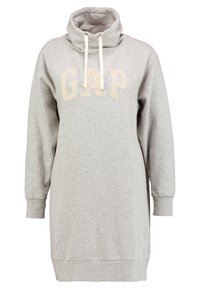 Vestito felpa grigio chiaro con collo alto a scialle, caratterizzato da un logo "GAP" color crema sulla parte anteriore. Polsini e orlo a coste. Tessuto morbido.