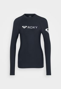 Mornarski rash guard dugih rukava s bijelim Roxy logotipom na prsima i rukavu, izrađen od lagane, rastezljive tkanine.