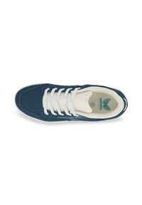 Navy canvas sneaker with white laces, padded collar, and a textured side panel; features a logo inside the shoe.
