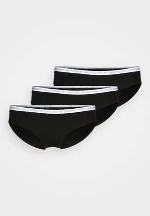 Zwarte katoenen boxershort in een set van drie. Voorzien van een witte elastische tailleband met "LACOSTE" merknaam. Gladde textuur en aansluitend ontwerp.