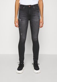 Tommy Jeans Jeans Skinny Fit - black denim
