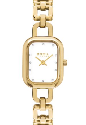 Gul rektangulær armbåndsur med hvid urskive, guldvisere og rhinsten-timetallere. Har et kraftigt armbånd i guld kæde design.