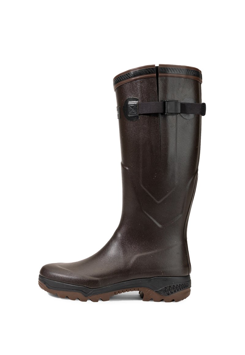 Brown waterproof rubber boot with a textured finish, raised zigzag pattern, and adjustable black strap detail at the calf. Treaded sole.