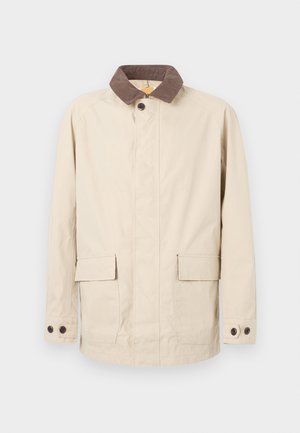 Beige jacket van katoen met een bruine corduroy kraag, voorzien van twee voorzakken en knoopaccenten op de manchetten.
