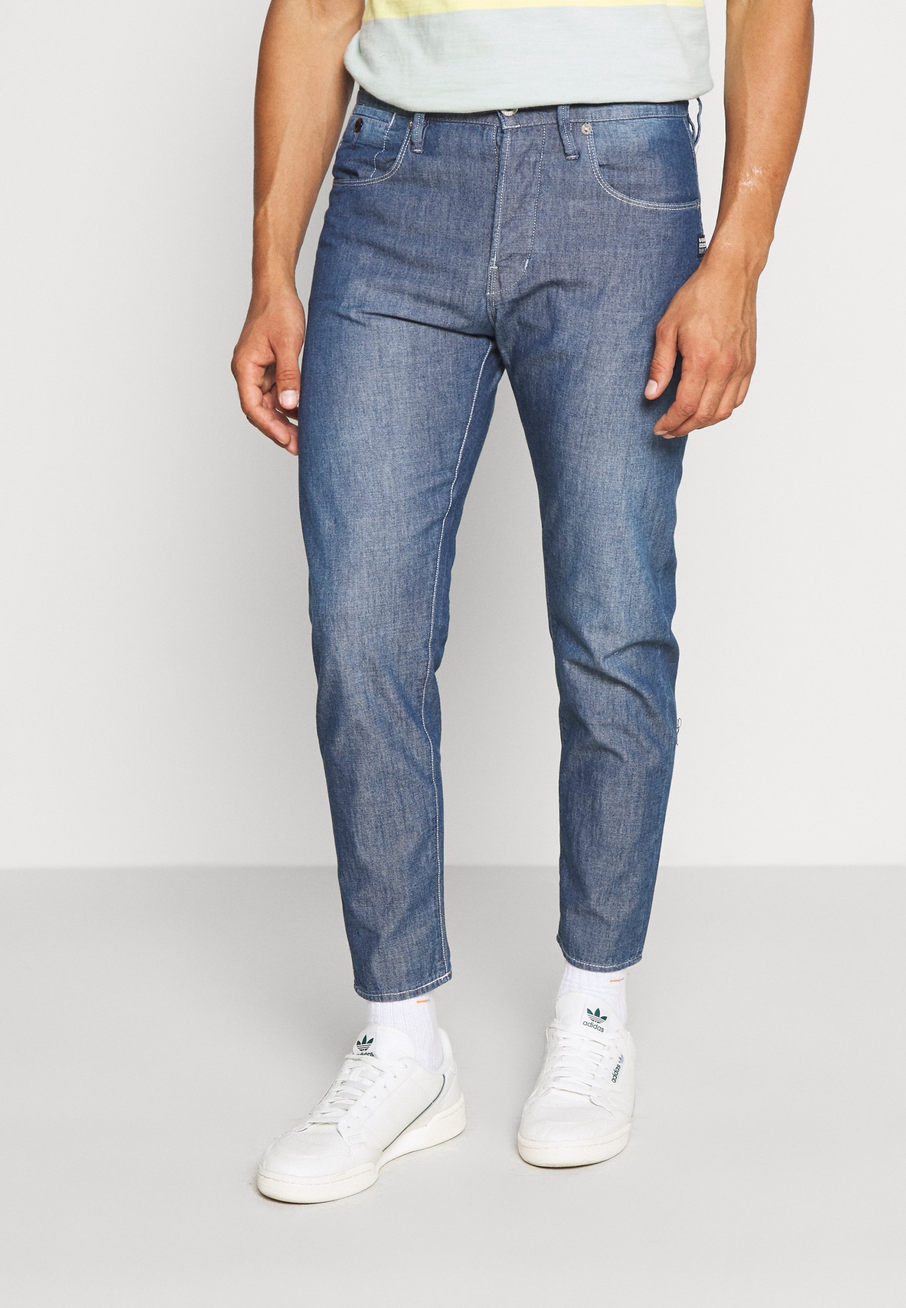 relaxed fit tapered jeans