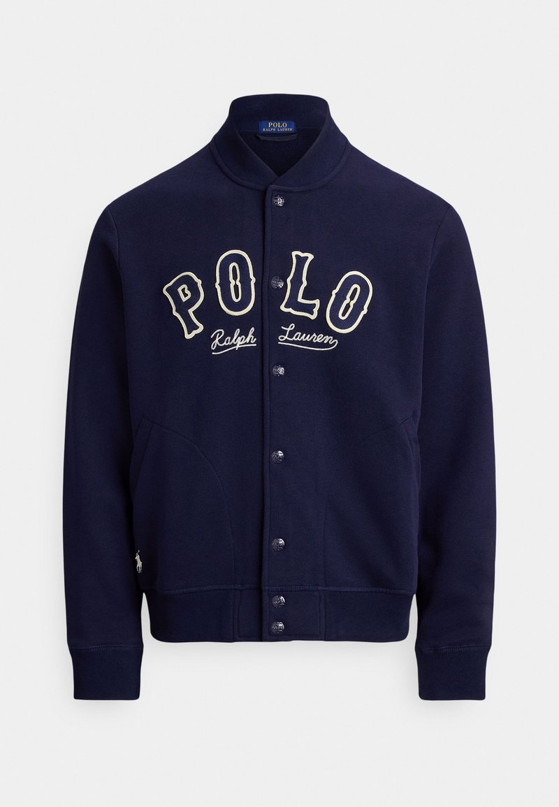 Navy blue sweatshirt jacket in a soft fabric, featuring a stand collar, front buttons, and contrasting white embroidered "POLO" logo.