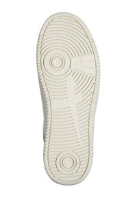 Gummisula i off-white med texturerade ribbor, cirkulära mönster och två cirkulära räfflor för grepp. Har en liten logotyp i mitten.
