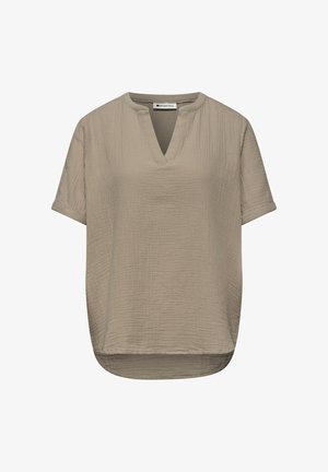 Beige kortærmet bluse med struktureret stof, rund halsudskæring med V-snit og en let buet sømkant.