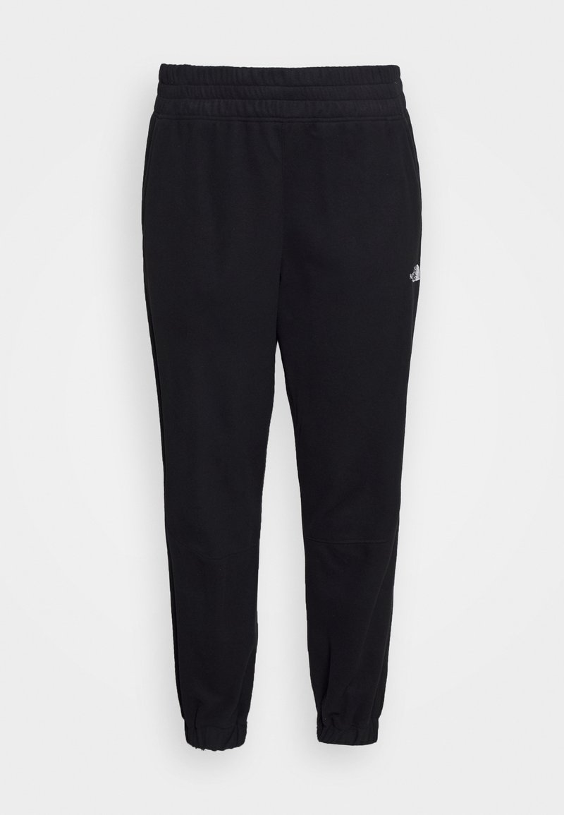 Black sweatpants made of soft material, featuring an elastic waistband, tapered cuffs, and a small logo on the right thigh.