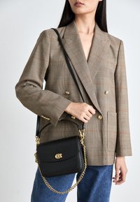 POLISHED PEBBLED CASSIE CROSSBODY - Handbag - black