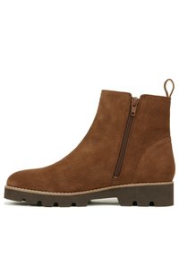 Bruine suède enkellaarzen met een rits aan de zijkant, ronde neus en een gestructureerde zool. Kenmerkt zich door een lus aan de achterkant voor gemakkelijk aan- en uittrekken.