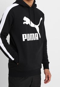 Puma Jersey con capucha - black