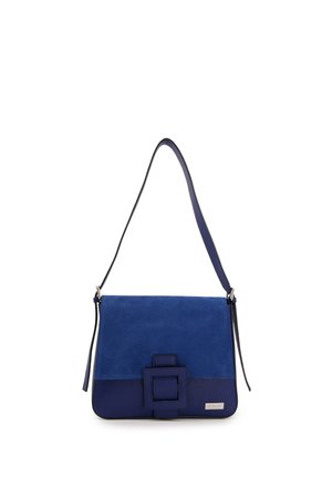 Navy blue handbag featuring suede and textured leather, a detachable shoulder strap, and a prominent rectangular buckle detail.