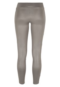 Leggings gris en tissu lisse et extensible avec une taille haute, un design ajusté et une construction sans couture.