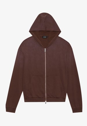 Rjava zip-up kapuca s kapuco, dolgimi rokavi in sprednjimi žepi. Narejena iz teksturirane tkanine, z glavno zadrgo v srebrni barvi in rebrastimi manšeti.
