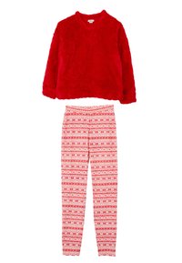 Červená chlupatá mikina s dlouhými rukávy a kulatým výstřihem, doplněná červenobílými legínami s geometrickými vzory.