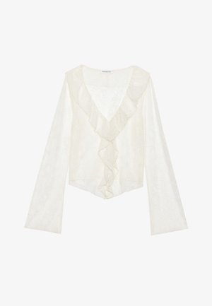 Witte kanten top met een diepe V-hals en een gefronde voorkant. Lange mouwen met een uitlopende ontwerp creëren een vloeiende silhouet.