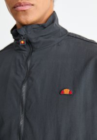 Ellesse VIARONNA - Summer jacket - black