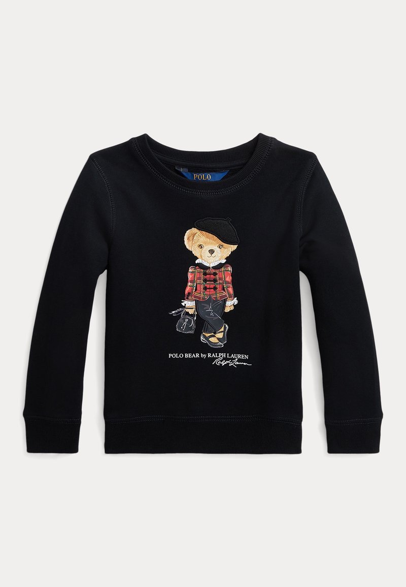 Sweat-shirt noir avec un ours brodé portant une chemise à carreaux, un béret et tenant un sac. Poignets et col côtelés avec couture contrastante.