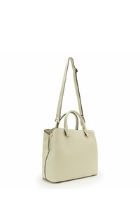 Cream leather handbag with dual top handles, detachable shoulder strap, gold hardware accents, and contrasting black edging.