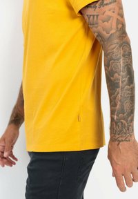 camel active KURZARM - T-shirt basic - cumin yellow