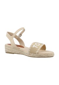 Beige espadrille-sandalen met een canvas bovenkant, open teen, enkelbandje en gevlochten jutezool. Witte branding op de voorste band.