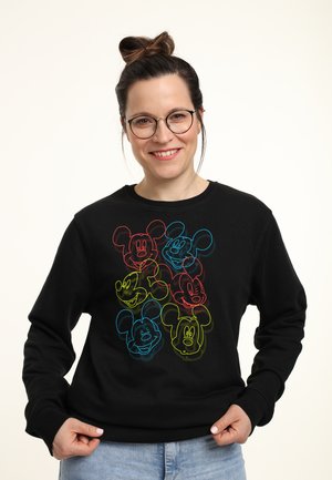 Sort sweatshirt med farverige neonlys om Mickey Mouse ansigtet i rød, gul og blå. Ribbet manchetter og kant. Glat tekstur.