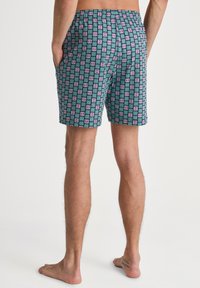 Mannen zwemshorts in een teal stof met een geometrisch patroon in roze en paars. Elastische tailleband met zijzakken; lichtgewicht en ademend.
