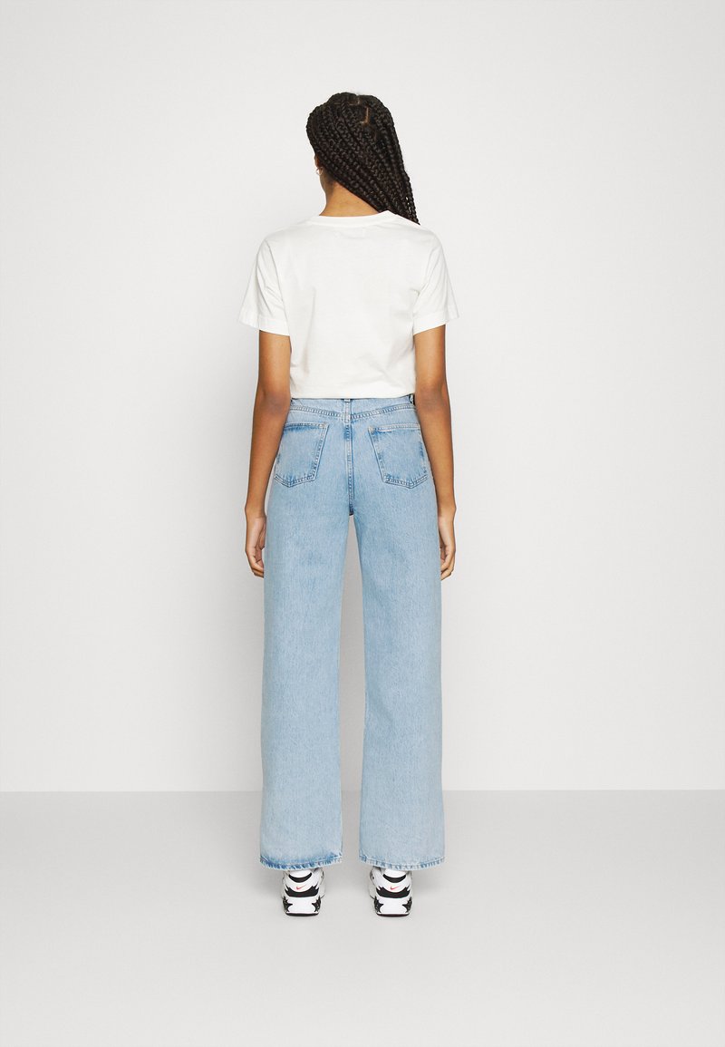 NA-KD VINTAGE LOOK WIDE SLIT - Vaqueros boyfriend light blue/azul claro -