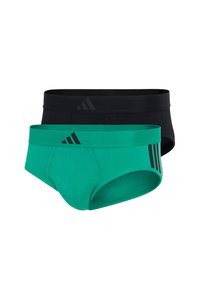 Deux paires de sous-vêtements masculins slips : une en vert avec une large ceinture verte et des accents noirs, l'autre en noir uni avec une ceinture assortie.