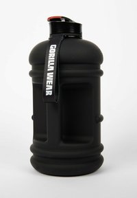 Black plastic water bottle with textured surface, red cap, and black strap featuring "GORILLA WEAR" in white text. Round base and ergonomic design.