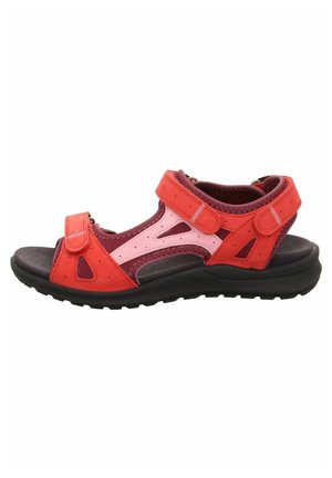 Red and pink sandal with a synthetic upper, adjustable Velcro straps, perforated accents, and a textured black rubber sole.