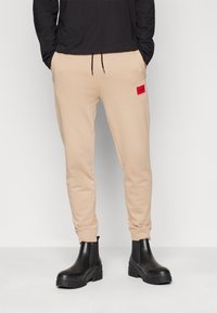 HUGO DOAK - Treningo apatinė dalis - medium beige