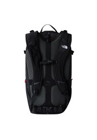 Mochila de exterior negra con correas de hombro ajustables y acolchadas, que cuenta con un panel trasero texturizado, múltiples hebillas y el logotipo de The North Face.
