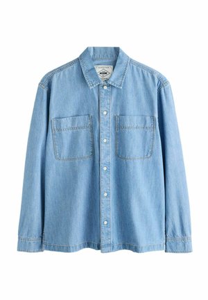 Hellblaues Jeanshemd mit spitz zulaufendem Kragen, zwei Brusttaschen, Knopfverschluss und langen Ärmeln mit gesteppten Säumen.