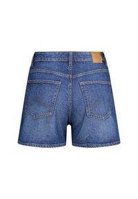 Denim shorts in medium blue, with a high waist, two back pockets, contrasting yellow stitching, and a brown leather label at the waistband.