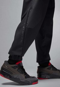 JORDAN SPORT JAM - Tepláky - black dark shadow