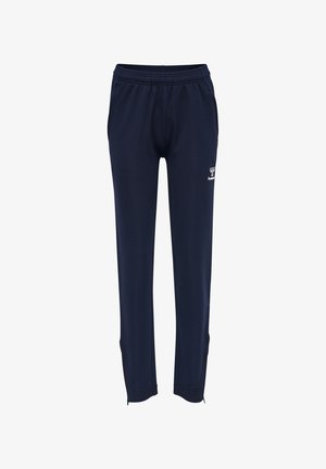 Marineblå atletikbukser med elastisk talje, sidelommer, tilspidsede ankler og hvidt brandlogo på øverste venstre ben.