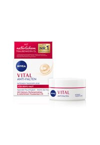 NIVEA VITAL Anti-Falten cream in a white jar with a pink stripe. Packaging includes a box with gold text and a pearl image, labeled for mature skin.