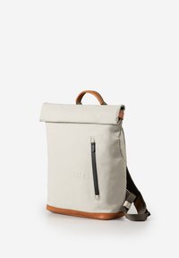 Light beige roll-top backpack with brown leather accents, a vertical front zipper pocket, and gray adjustable shoulder straps.