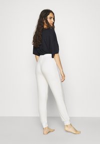 DORINA CALM - Calças de pijama - ivory