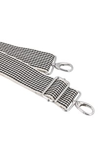 Woven strap with alternating black and white stripes, featuring silver hardware clips and a rectangular metal loop. Soft texture.