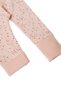 Lichtroze leggings met een delicaat patroon van kleine bruin vogeltjesilhouetten, met ribbelmanchetten in een bijpassende kleur voor een strakke pasvorm.