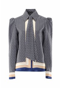 Langärmlige Bluse in Marineblau und Creme mit geometrischem Muster, ausgestattet mit einem Kragen, Bindedetails und kontrastierenden Abschlüssen an den Manschetten und dem Saum.