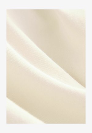 Cremfarbener Stoff mit einer weichen, glatten Textur. Besitzt sanfte Falten und ein feines, gleichmäßiges Webmuster.