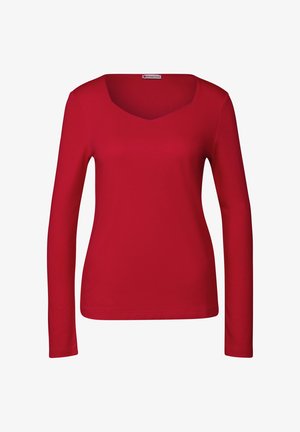 Czerwona koszulka z długim rękawem i dekoltem w szpic. Wykonana z gładkiego materiału, ma dopasowany krój i prosty dół.