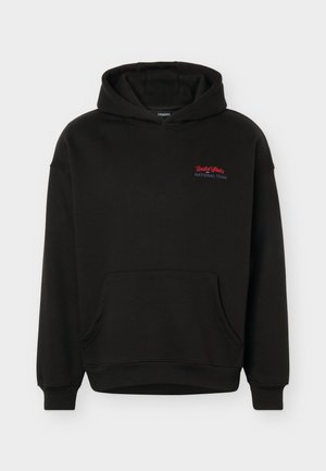 Μαύρο φούτερ με κουκούλα, μπροστινή τσέπη και μικρό κόκκινο και μπλε κείμενο "United States National Team" στο αριστερό στήθος.