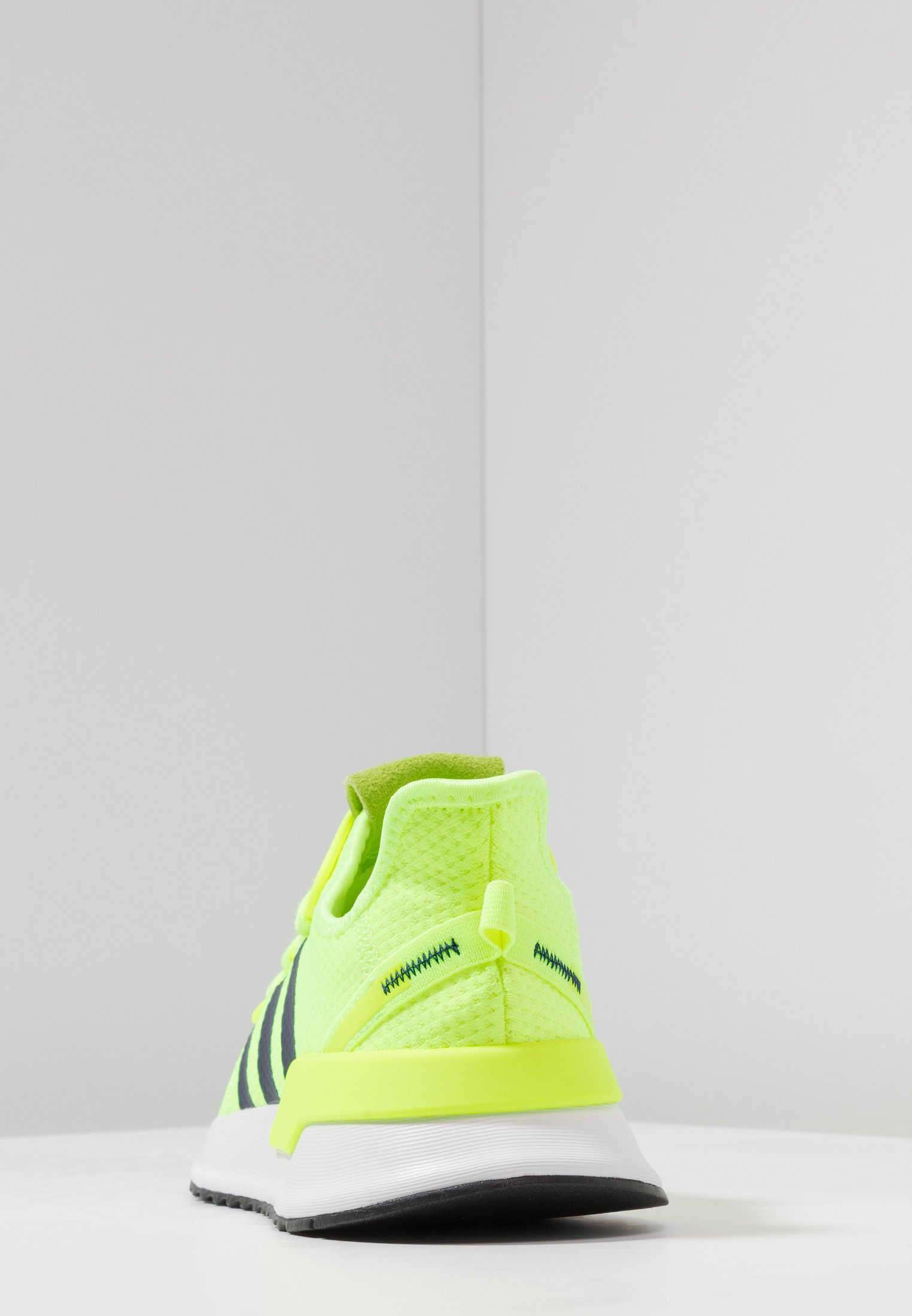 adidas originals u path trainers in grey and yellow