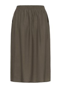 Jupe vert olive avec une taille élastique, coupe ample, mi-longue, en tissu texturé, avec des poches latérales et un design simple.