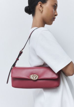 Next, ELONGATED SHOULDER BAG . - Käekott - red